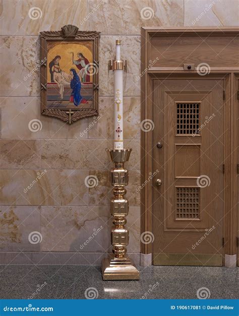 Ornate Lamp And The 14th Station Of The Cross Inside Christ The King