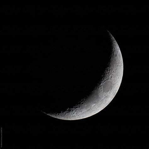 The Crescent Moon In The Night Sky By Stocksy Contributor Tim Booth