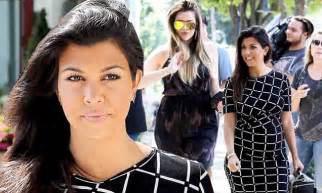 Kourtney Kardashian Upstages Sister Khloe As She Wows In Chic Dress In