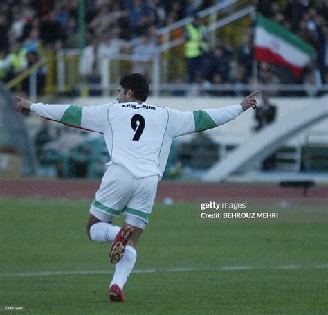 Vahid Hashemian Jubilates After Scoring Irans First Goal Against The