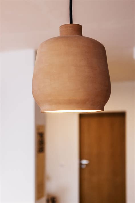 A Ceramic Pendant Light With An Earthy Handmade Aesthetic Ceramics