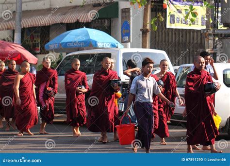 Traditional Alms Giving Ceremony Of Distributing Food To Buddhist Monks