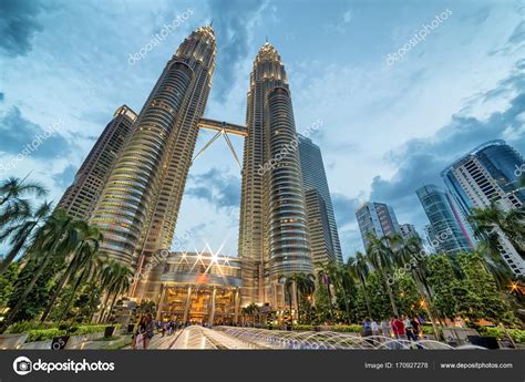 What to do in kuala lumpur? Petronas Twin towers and Suria KLCC. - Stock Editorial ...