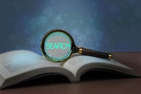 Magnifying Glass On A Book The Concept Of Finding Or Searching For An