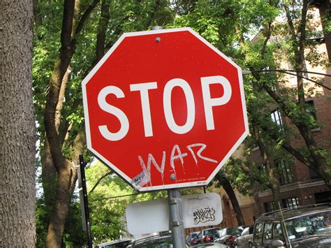 Stop sign graffiti | Graffiti turns a stop sign into an anti… | Flickr