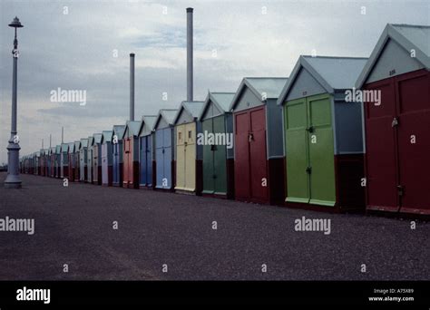 Row Of Brightly Coloured Beach Huts Brighton England Uk Stock Photo Alamy