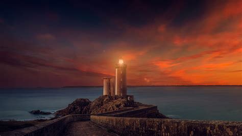 Hd Wallpaper Yellow Sunset Lighthouse 5k Scenic Sky Water