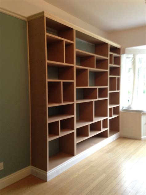 The easiest way to build a vaulted ceiling onto your home is to plan for it during the construction phase of the house. Fitted shelving, cupboards and flooring - P D Carpentry ...