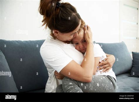 Mother Hugging Daughter Sad Hi Res Stock Photography And Images Alamy