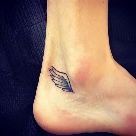 Cute And Small Angel Wing Design Tattoos On The Ankle Ankle Tattoo