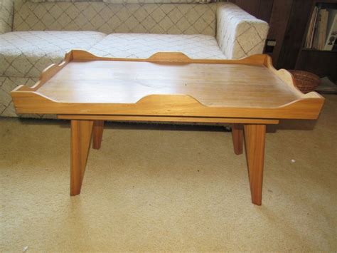 The dimensions are 33″ long x 19.5″. BlindSquirrelAuctions - Small Vintage Wood MCM Coffee Table