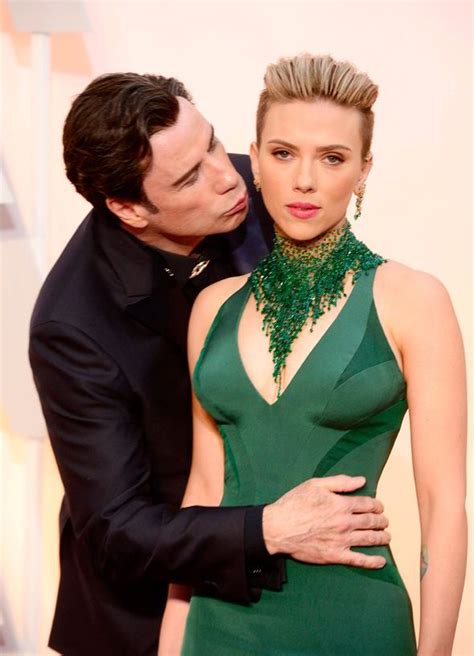 Scarlett Johansson Looks Rather Awkward As John Travolta Leans In For
