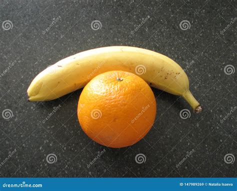 A Banana And An Orange On The Table Stock Image Image Of Fresh Diet