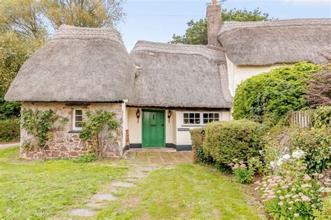 Picturesque 16th Century Cottage With A Thatched Roof Is For Sale In