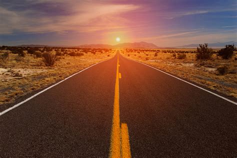 Desert Road And Sunset On Horizon Stock Photo Download Image Now Istock