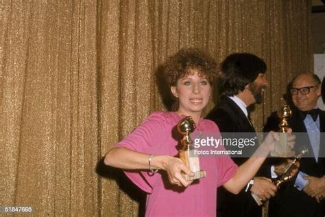 American Actress And Singer Barbra Streisand Holds Her Two Awards At News Photo Getty Images