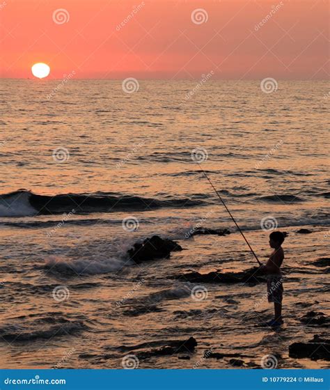 Fisherman At Sunset Stock Photo Image Of Fisherman Pink 10779224