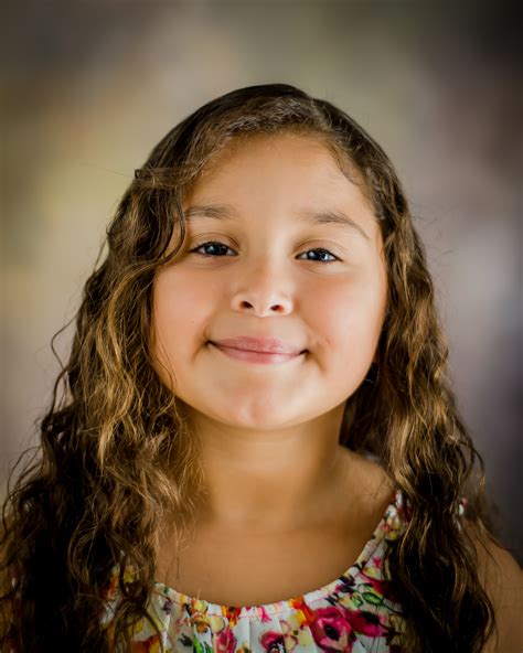 Portrait Of A Little Adorable Little Girl Smiling In
