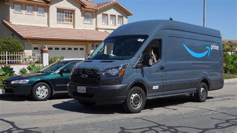 Amazon prime is a paid subscription program from amazon which is available in various countries and gives users access to additional services otherwise unavailable or available at a premium to regular. Amazon Prime Delivery Van Out On Deliveries In Suburban Neighborhood. Photo Taken In Carlsbad ...