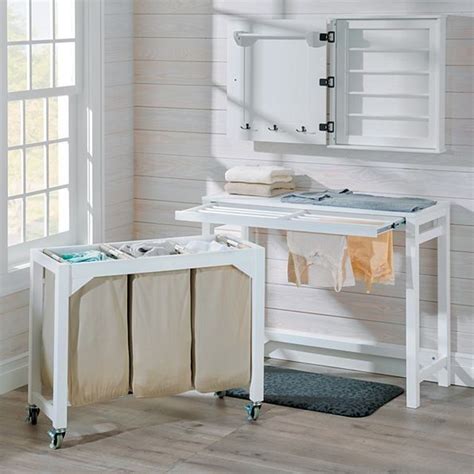 Our Laundry Folding Table With 3 Clothes Hampers Does It All A Hamper Drying Rack And Foldin