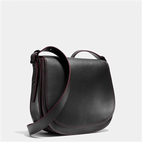 Available in styles and colours designed to suit any situation, they guarantee elegance for all occasions. Coach Saddle Bag In Glovetanned Leather in Black (MATTE ...