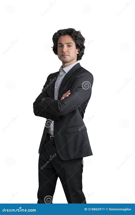 Side View Of Handsome Businessman Standing With Arms Crossed Pose