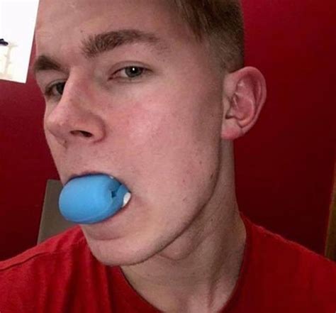 Men Desperate For A Chiselled Jaw Are Chewing A Rubber Ball As Part Of