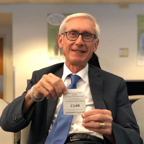 tony evers on twitter stopped by the dmv this morning to pick up my new photo id it was easy