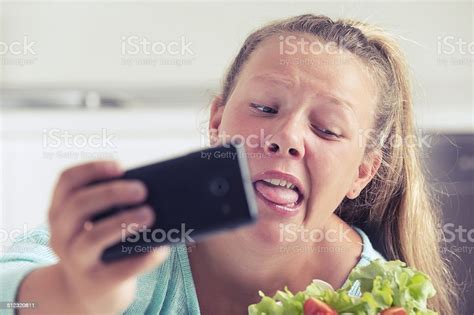 Teenage Girl Taking A Silly Selfie With Food Stock Photo Download