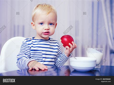 Boy Cute Baby Eating Image And Photo Free Trial Bigstock