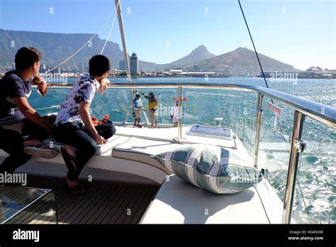 Cape Town A Luxury Yacht With Asian Tourists On Board Approaches Cape