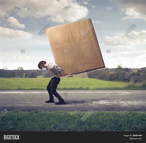 Man Carrying On His Image And Photo Free Trial Bigstock