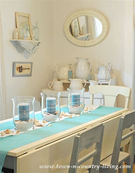 Traditional setup and a lot of coastal vibes on this dining room. How to Create a Summer Coastal Centerpiece | Dining room ...