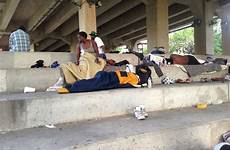 homeless encampments camps defendernetwork homelessness crews cleanups intersections underpasses removed debris