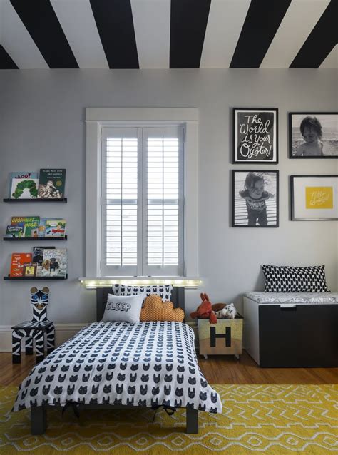 These decorating tips will win you major in the boys' bedroom of a colorful east hampton home, bunk beds by pottery barn kids are in this manhattan home designed by steven gambrel, maps serve as colorful decor in the playful, vibrant. Graphic and Modern Toddler Boy Room | Toddler rooms, Boy ...