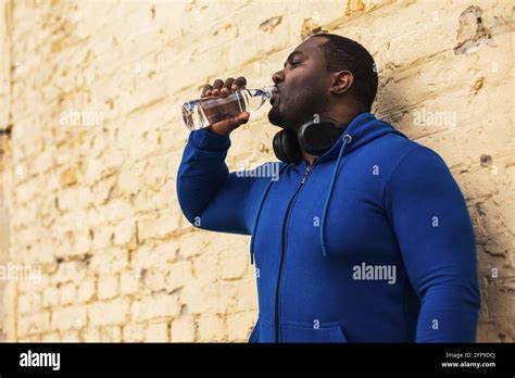 Sporty Man Drinking Water Outdoor Stock Photo Alamy