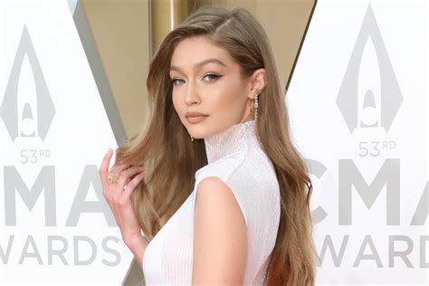 Pregnant Gigi Hadid Shows Off Baby Bump In Sheer Dress For Photoshoot