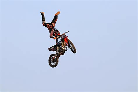 Dirt Bike Stunts In The Air Xvi Photograph By Debbie Oppermann Pixels