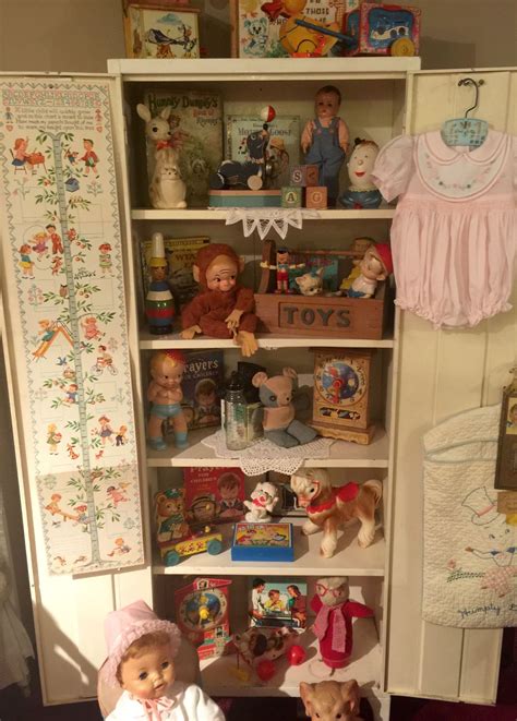 Old Metal Cabinet Filled With Some Little Treasures Vintage Toy Display Displaying