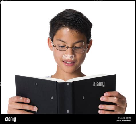 Boy Reading A Book Stock Photo Alamy