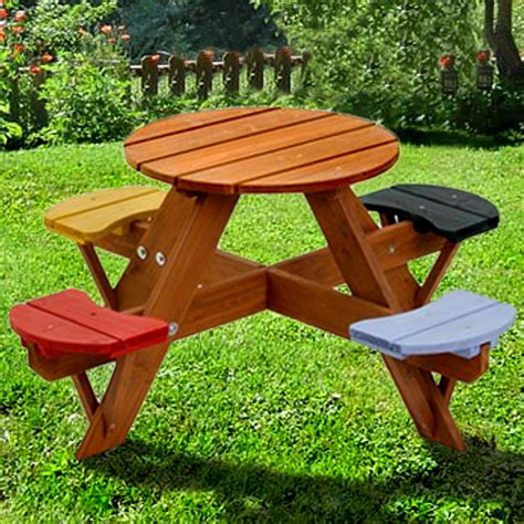 This wooden picnic table is easy to assemble. Swing Town Kids Picnic Table & Reviews | Wayfair