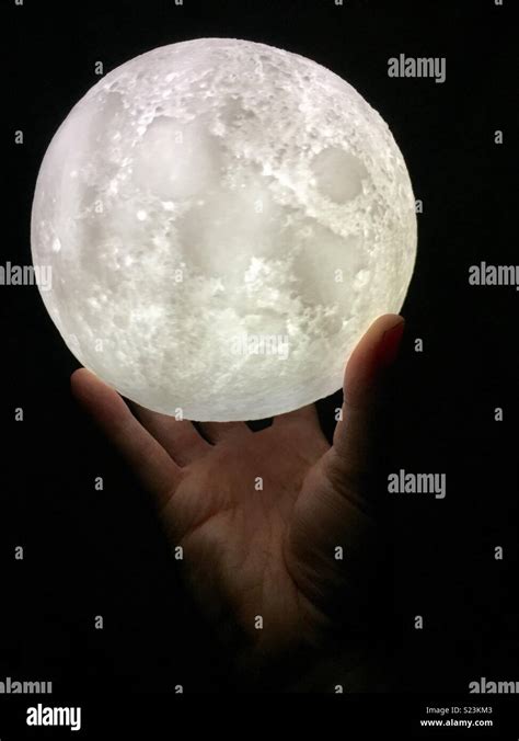 Hand Holding Moon Globe Stock Photo Alamy