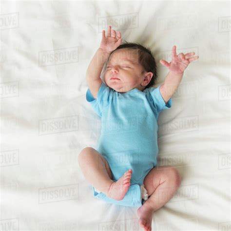 Portrait Of Newborn Baby Boy 0 1 Months Sleeping Stock Photo Dissolve