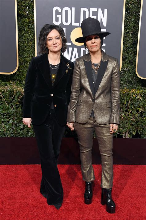Sara Gilbert And Wife Linda Perry Step Out In Hers And Hers Suits At The Golden Globes
