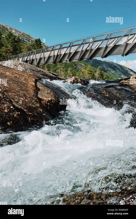 The Architect Designed Steel Bridge Over The Likholefossen Waterfall On