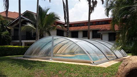 A retractable pool enclosure is an adjustable swimming pool cover which protects it from harsh weather conditions. Build Your own Pool Enclosure: The Complete Guide - Excelite Pool