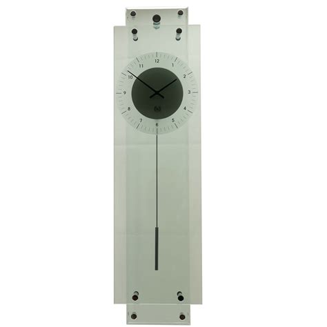 Minimalist art glass pendulum clock invites the wall behind to participate in the fun with cambron's 99 percent translucent fused glass pendulum clock! Glass Pendulum Clock