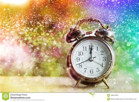 Alarm Clock Showing Midnight On New Year Or Christmas Day With Colorful