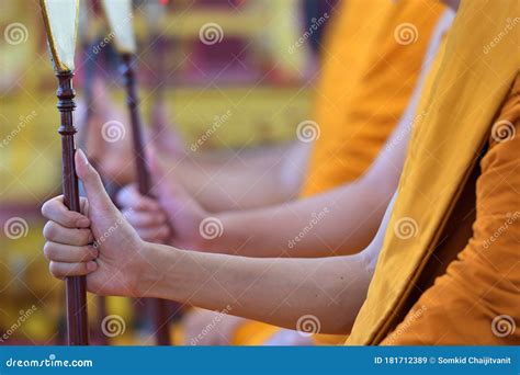 Buddhist Monkand X27s Hand Holding Palm Leaf In Chanting Ceremony In A