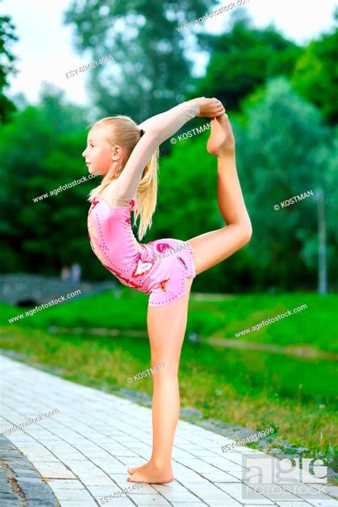 Image Of Flexible Babe Girl Doing Gymnastics Vertical Split Stock Photo Picture And Low